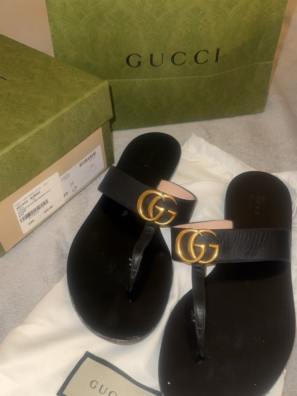 Gucci Black Leather GG Thong Sandals with Gold Hardware